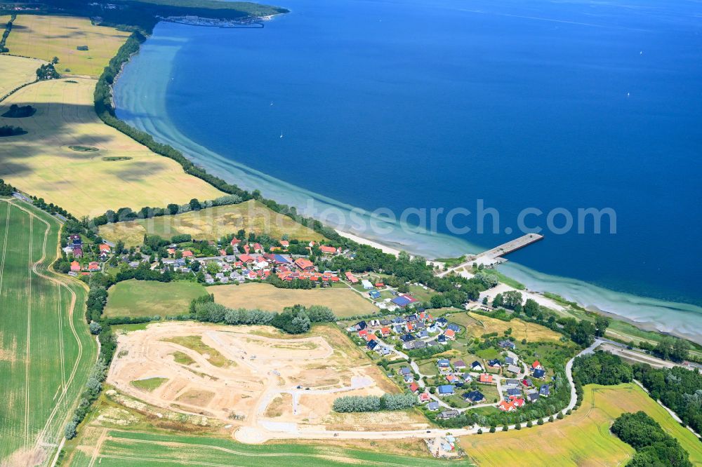 Aerial image Wohlenberg - Construction site for the construction of a new apartment building used for holiday apartments on the Ostseeblick street in Wohlenberg in the state Mecklenburg-Western Pomerania, Germany