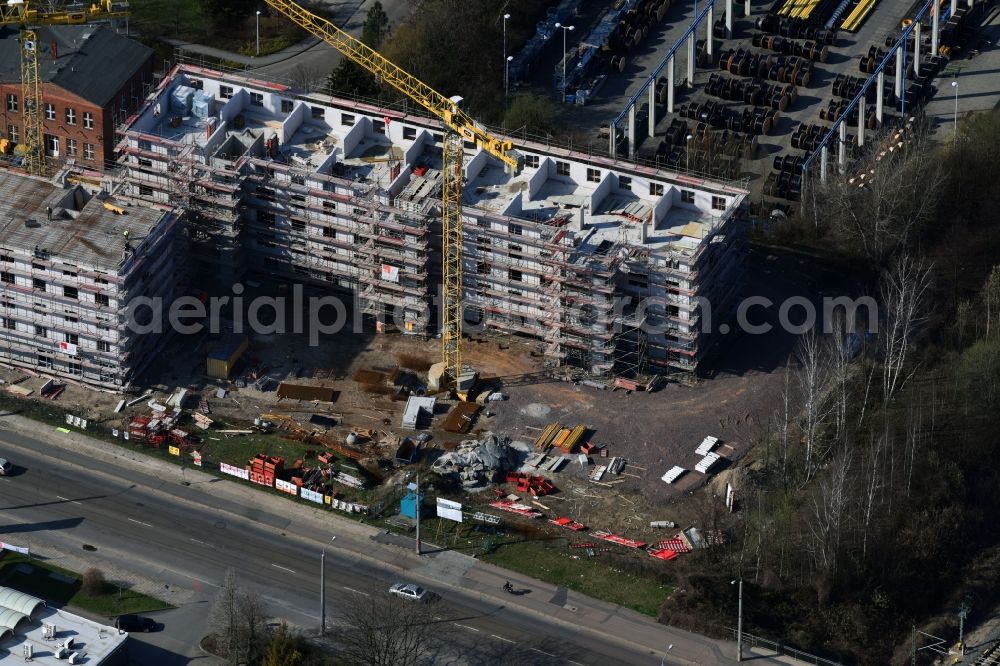 Leipzig from the bird's eye view: Construction site for the new building of Asylum accommodation buildings of LESG Gesellschaft of Stadt Leipzig to the Erschliessung, Entwicklung and Sanierung von Baugebieten mbH on Arno-Nitzsche-Strasse in the district Connewitz in Leipzig in the state Saxony