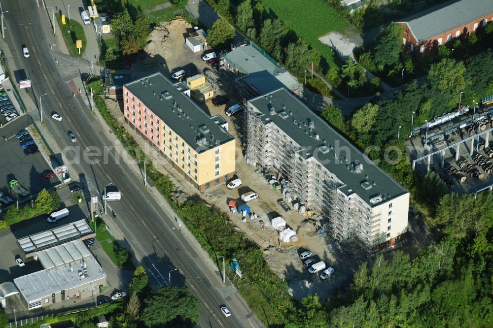 Aerial photograph Leipzig - Construction site for the new building of Asylum accommodation buildings of LESG Gesellschaft of Stadt Leipzig to the Erschliessung, Entwicklung and Sanierung von Baugebieten mbH on Arno-Nitzsche-Strasse in the district Connewitz in Leipzig in the state Saxony