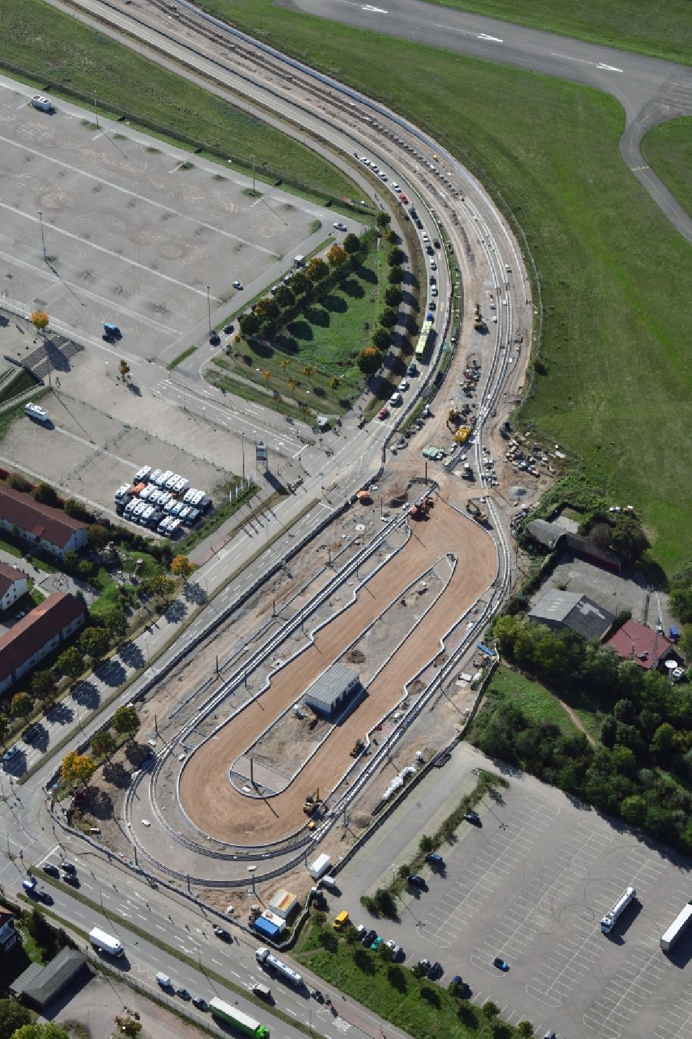 Aerial image Freiburg im Breisgau - Construction works for the track systems of the S-Bahn final station Messe at the Madisonallee in Freiburg im Breisgau in the state Baden-Wurttemberg, Germany