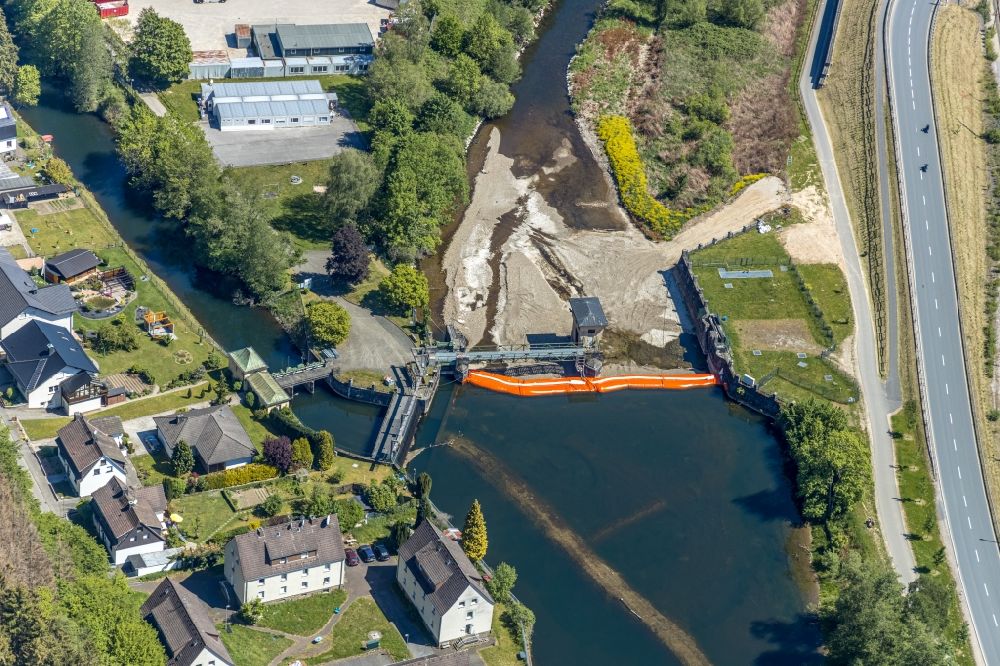 Aerial photograph Finnentrop - Construction site of the canal works on the course of the canal of Lenne and of Obergraben in Finnentrop in the state North Rhine-Westphalia, Germany