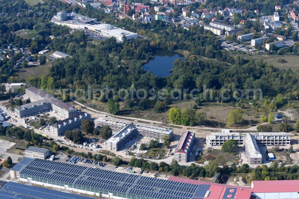 Aerial photograph Bernau - Construction site for the renovation and reconstruction of the building complex of the former military barracks redevelopment area Panke-Park on Schoenfelder Weg in Bernau in the state Brandenburg, Germany