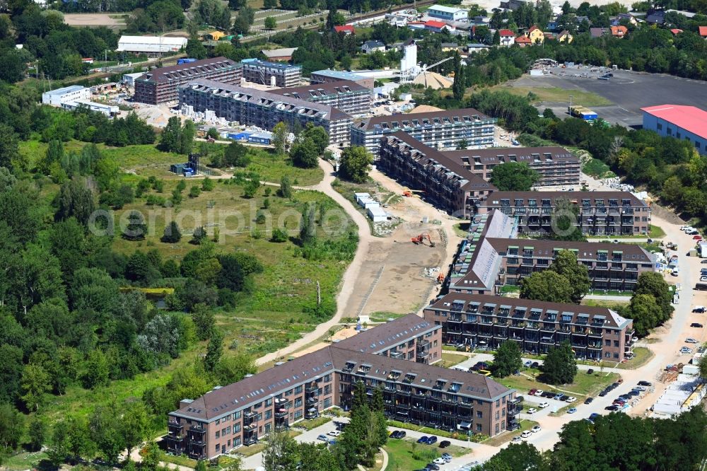 Bernau from above - Construction site for the renovation and reconstruction of the building complex of the former military barracks Sanierungsgebiet Panke-Park on Schoenfelder Weg in Bernau in the state Brandenburg, Germany