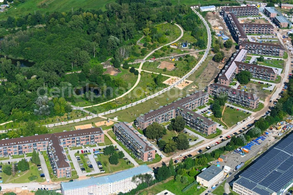Bernau from above - Construction site for the renovation and reconstruction of the building complex of the former military barracks redevelopment area Panke-Park on Schoenfelder Weg in Bernau in the state Brandenburg, Germany