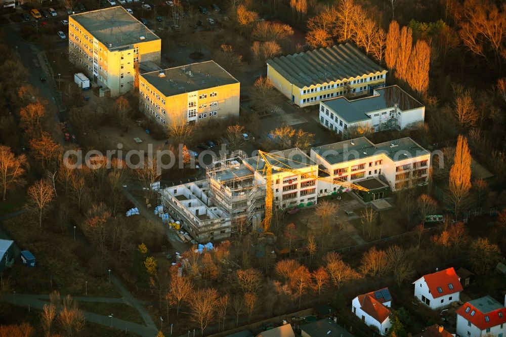 Berlin from above - New construction site for the construction of a kindergarten building and Nursery school and the campus of the Jugendwerk Aufbau Ost JAO gGmbH on Nossener Strasse in the district Hellersdorf in Berlin, Germany