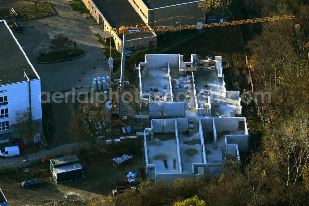 Berlin from above - New construction site for the construction of a kindergarten building and Nursery school Die Arche on street Tangermuender Strasse in the district Hellersdorf in Berlin, Germany