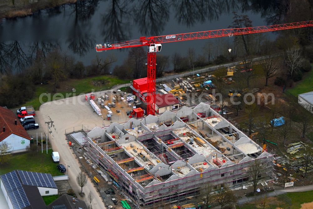 Grafenrheinfeld from above - New construction site for the construction of a kindergarten building and Nursery school and comprehensive daycare center on street Am Wehrbusch in Grafenrheinfeld in the state Bavaria, Germany