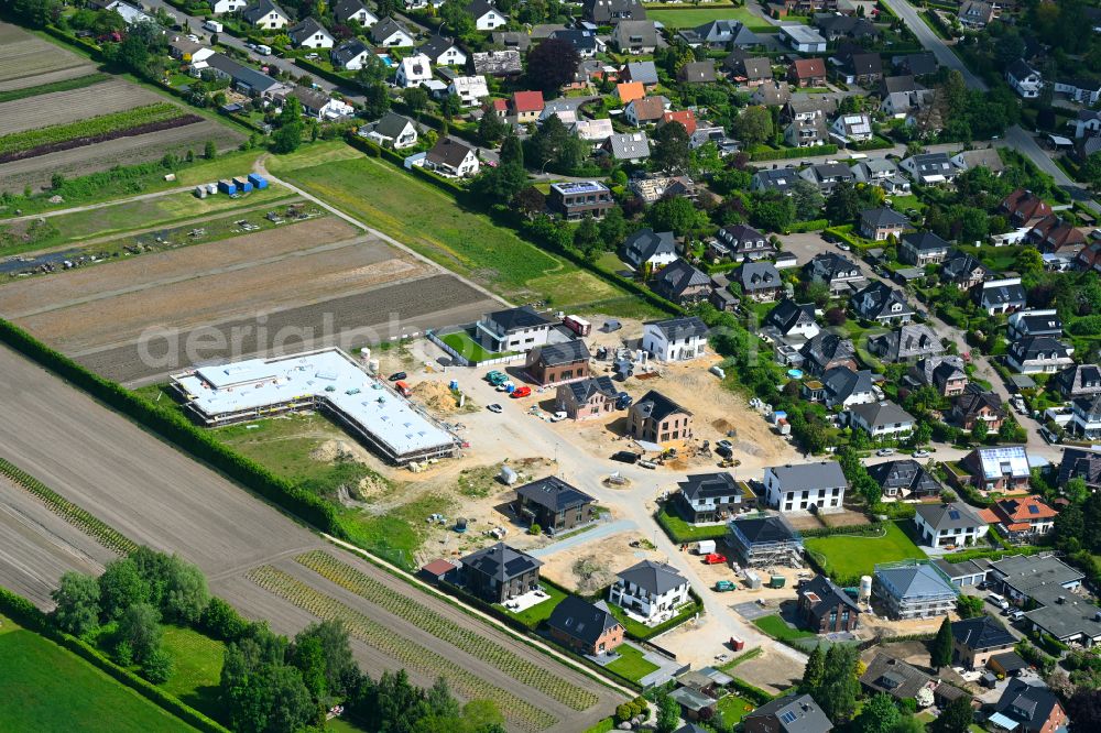 Aerial image Rellingen - New construction site for the construction of a kindergarten building and Nursery school on street Lohacker in Rellingen in the state Schleswig-Holstein, Germany