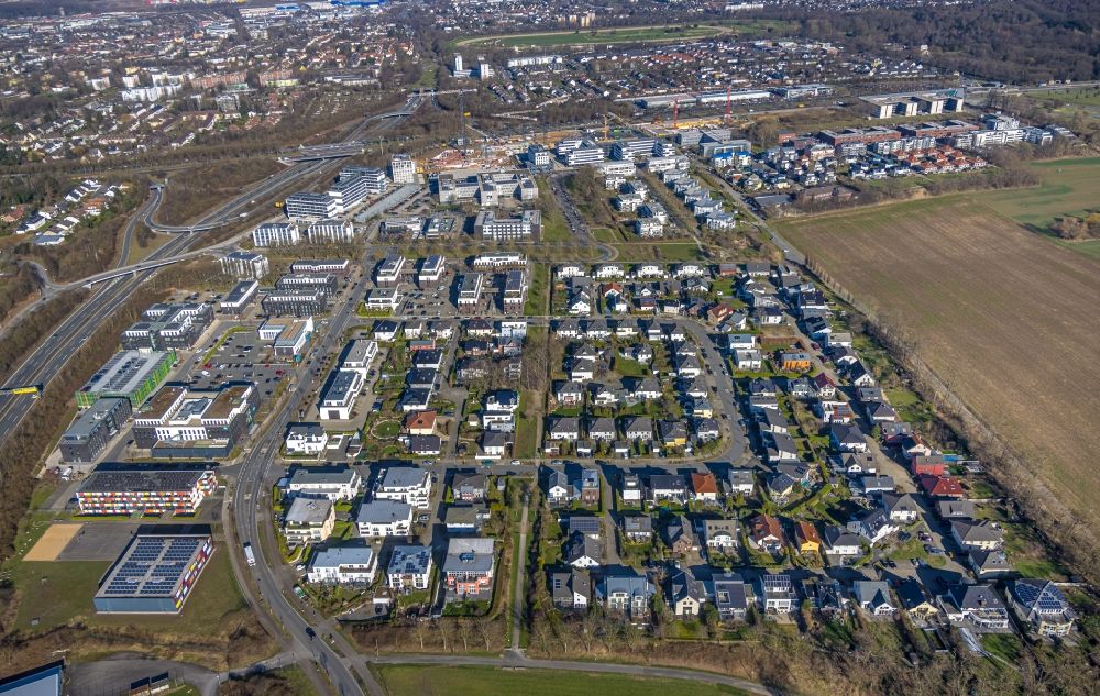 Dortmund from the bird's eye view: Residential area construction site of a mixed development with multi-family houses and single-family houses- New building at the Lissaboner Allee - Londoner Bogen in Dortmund at Ruhrgebiet in the state North Rhine-Westphalia, Germany