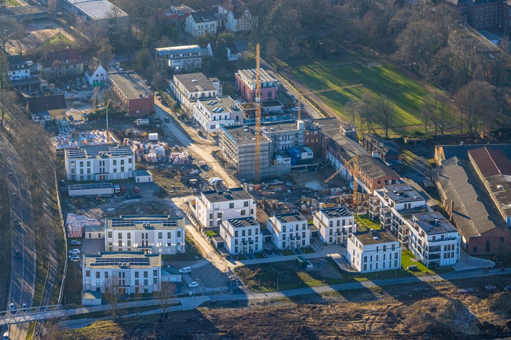 Aerial image Soest - Residential area construction site of a mixed development with multi-family houses and single-family houses- New building at the Merkurhoefe in Soest in the state North Rhine-Westphalia, Germany