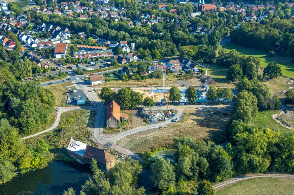 Aerial image Hamm - Residential area construction site of a mixed development with multi-family houses and single-family houses- New building at the castle mill and homestead - farm ruins at Muehlenteich in Hamm at Ruhrgebiet in the state North Rhine-Westphalia, Germany