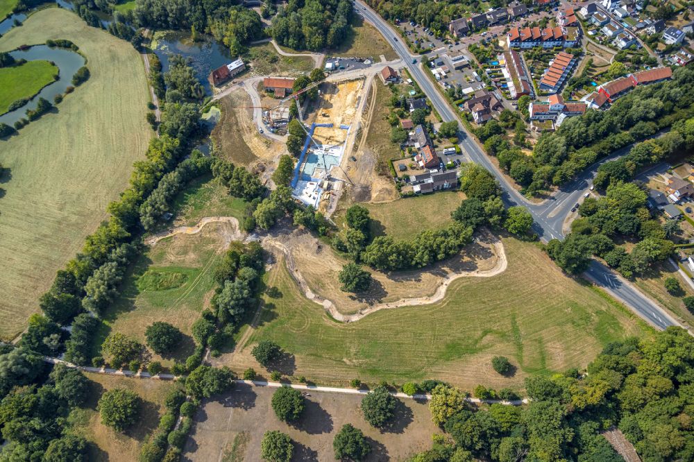 Hamm from above - Residential area construction site of a mixed development with multi-family houses and single-family houses- New building at the castle mill and homestead - farm ruins at Muehlenteich in Hamm at Ruhrgebiet in the state North Rhine-Westphalia, Germany