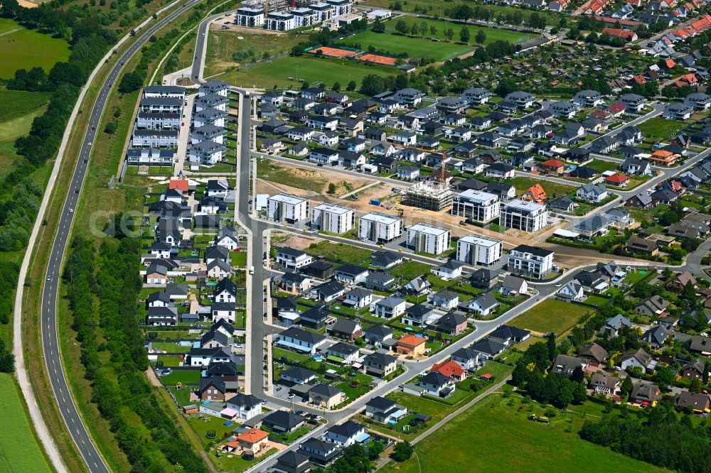 Aerial photograph Wolfsburg - Residential area construction site of a mixed development with multi-family houses and single-family houses- New building at the to the Widzaehnecke - Vor dem Teichdamme in the district Wendschott in Wolfsburg in the state Lower Saxony, Germany