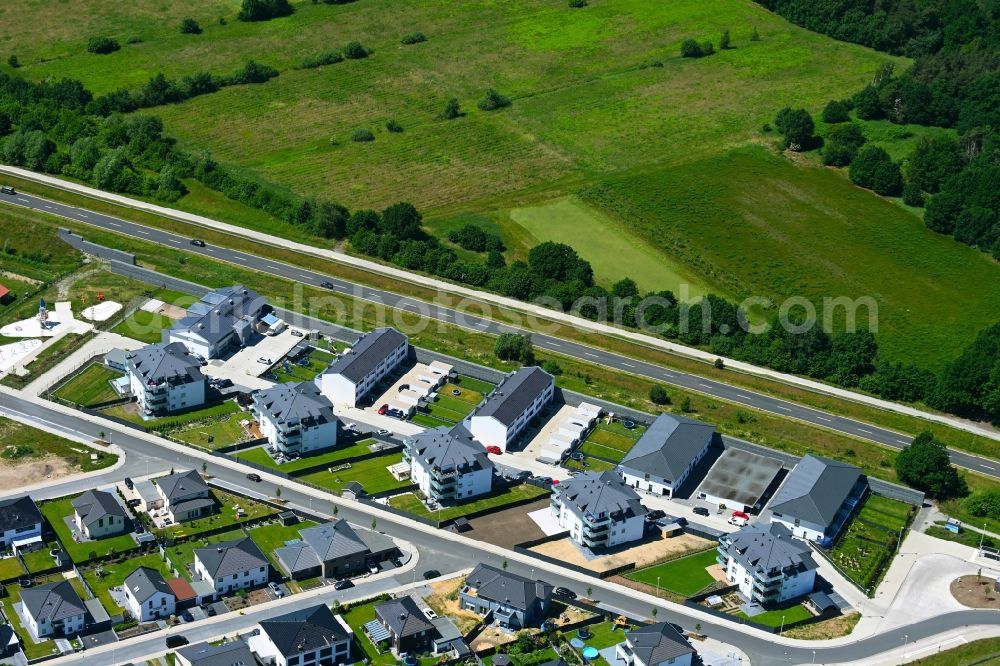 Aerial image Wolfsburg - Residential area construction site of a mixed development with multi-family houses and single-family houses- New building at the to the Widzaehnecke - Vor dem Teichdamme in the district Wendschott in Wolfsburg in the state Lower Saxony, Germany