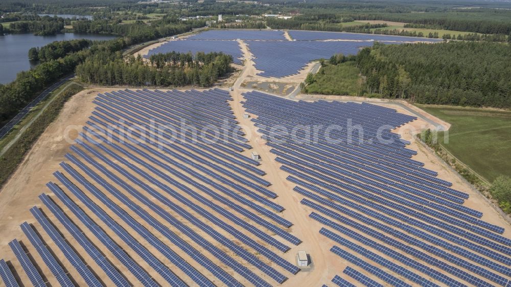 Aerial image Grafenwöhr - Construction site and assembly work for solar park and solar power plant by Wirsol and operated by ZENO Zukunftsenergie Nordoberpfalz, Sonnenpark Huetten GmbH & Co.KG in the district Huetten in Grafenwoehr in the state Bavaria
