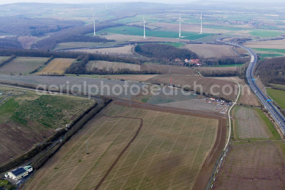 Rosdorf from the bird's eye view: Construction site and assembly work for solar park and solar power plant on street A38 in Rosdorf in the state Lower Saxony, Germany