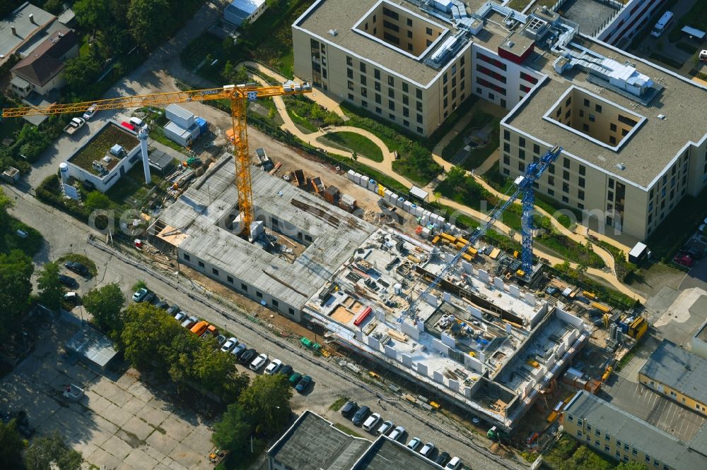 Berlin from the bird's eye view: Construction site of a new build retirement home of Vivantes Forum fuer Senioren GmbH on Muensterberger Weg in the district Kaulsdorf in Berlin, Germany