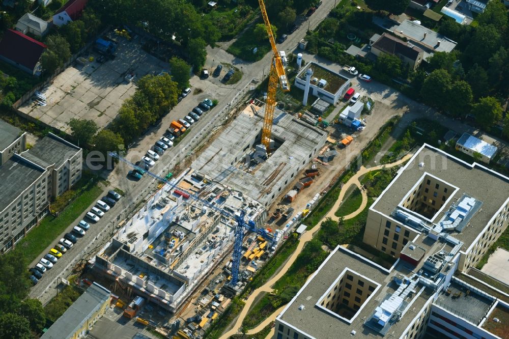 Aerial photograph Berlin - Construction site of a new build retirement home of Vivantes Forum fuer Senioren GmbH on Muensterberger Weg in the district Kaulsdorf in Berlin, Germany