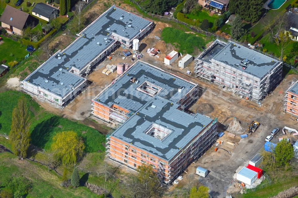 Berlin from above - Construction site of a new build retirement home on Wernergraben corner Sudermannstrasse in the district Mahlsdorf in Berlin, Germany