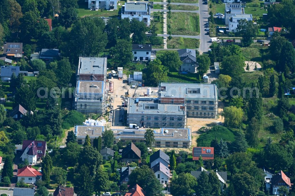 Berlin from above - Construction site of a new build retirement home on Wernergraben corner Sudermannstrasse in the district Mahlsdorf in Berlin, Germany