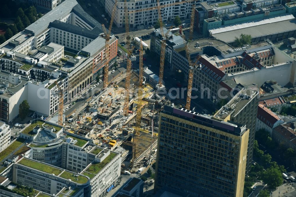 Berlin from above - Construction site with pile foundation work for the foundation plate of the new building Axel Springer Campus - OMA to Krausenstrasse - Schuetzenstrasse in Berlin