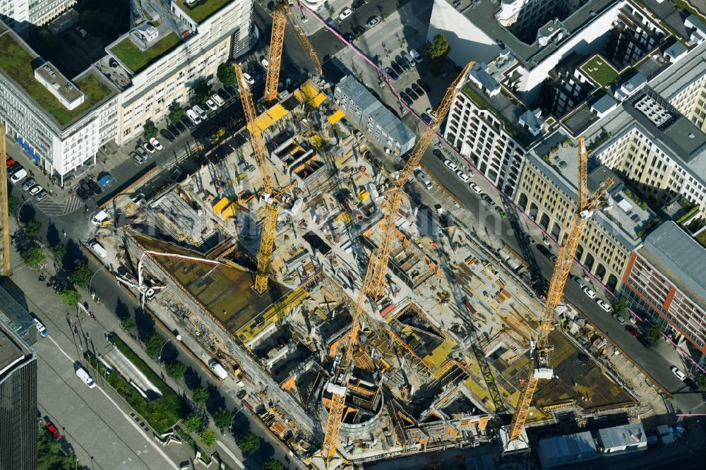 Aerial image Berlin - Construction site with pile foundation work for the foundation plate of the new building Axel Springer Campus - OMA to Krausenstrasse - Schuetzenstrasse in Berlin