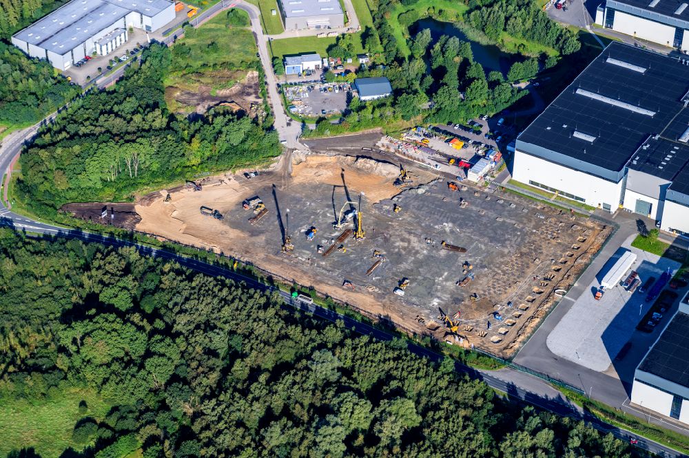 Aerial photograph Stade - Construction site with pile foundation on the Airbus factory site for the construction of a new logistics hall in Stade in the state Lower Saxony, Germany