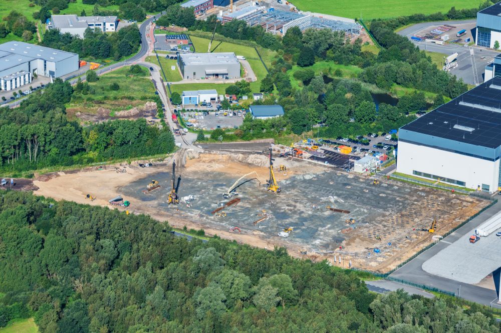 Stade from above - Construction site with pile foundation on the Airbus factory site for the construction of a new logistics hall in Stade in the state Lower Saxony, Germany
