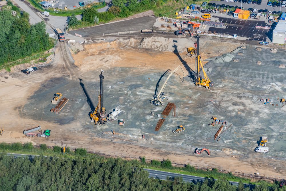 Stade from the bird's eye view: Construction site with pile foundation on the Airbus factory site for the construction of a new logistics hall in Stade in the state Lower Saxony, Germany