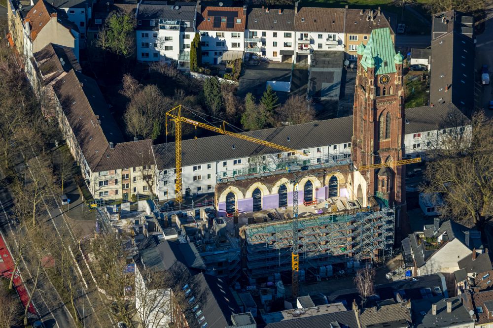 Bochum from the bird's eye view: Construction site for renovation and reconstruction work on the church building Antonius-Quartier on street Arnoldstrasse - Antoniusstrasse - Bessemerstasse in the district Innenstadt in Bochum at Ruhrgebiet in the state North Rhine-Westphalia, Germany