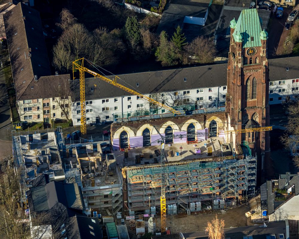 Aerial image Bochum - Construction site for renovation and reconstruction work on the church building Antonius-Quartier on street Arnoldstrasse - Antoniusstrasse - Bessemerstasse in the district Innenstadt in Bochum at Ruhrgebiet in the state North Rhine-Westphalia, Germany