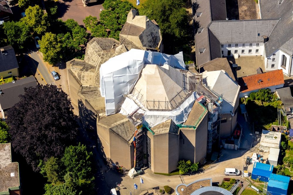 Velbert from the bird's eye view: Construction site for renovation and reconstruction work on the church building of the cathedral of Mariendom Neviges on Loeher Strasse in Velbert in the state North Rhine-Westphalia, Germany