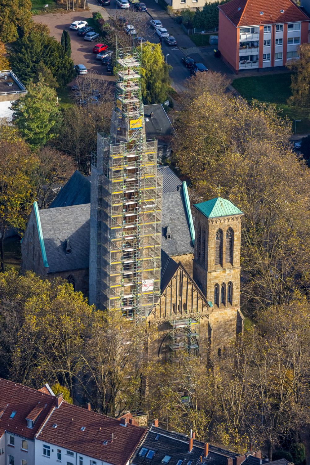 Herne from above - Construction site for renovation and reconstruction work on the church building Herz Jesu Kirche on street Duengelstrasse in Herne at Ruhrgebiet in the state North Rhine-Westphalia, Germany