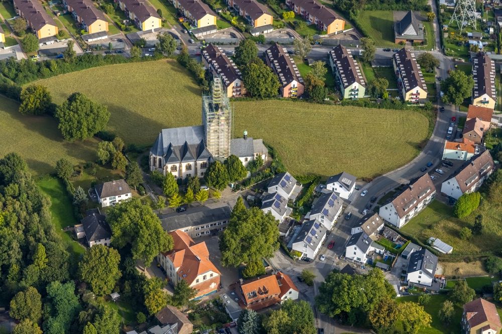 Dortmund from above - Construction site for renovation and reconstruction work on the church building and church tower of the catholic church St. Josef on Dasselstrasse in the district Kirchlinde-Alt in Dortmund at Ruhrgebiet in the state North Rhine-Westphalia, Germany