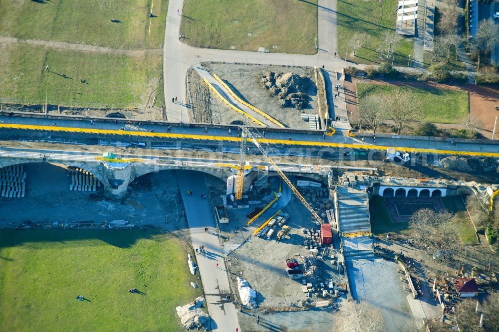 Aerial image Dresden - Construction to renovation work on the road bridge structure Augustusbruecke about the shore of elbe river in Dresden in the state Saxony, Germany