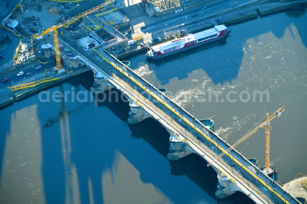 Dresden from the bird's eye view: Construction to renovation work on the road bridge structure Augustusbruecke about the shore of elbe river in Dresden in the state Saxony, Germany