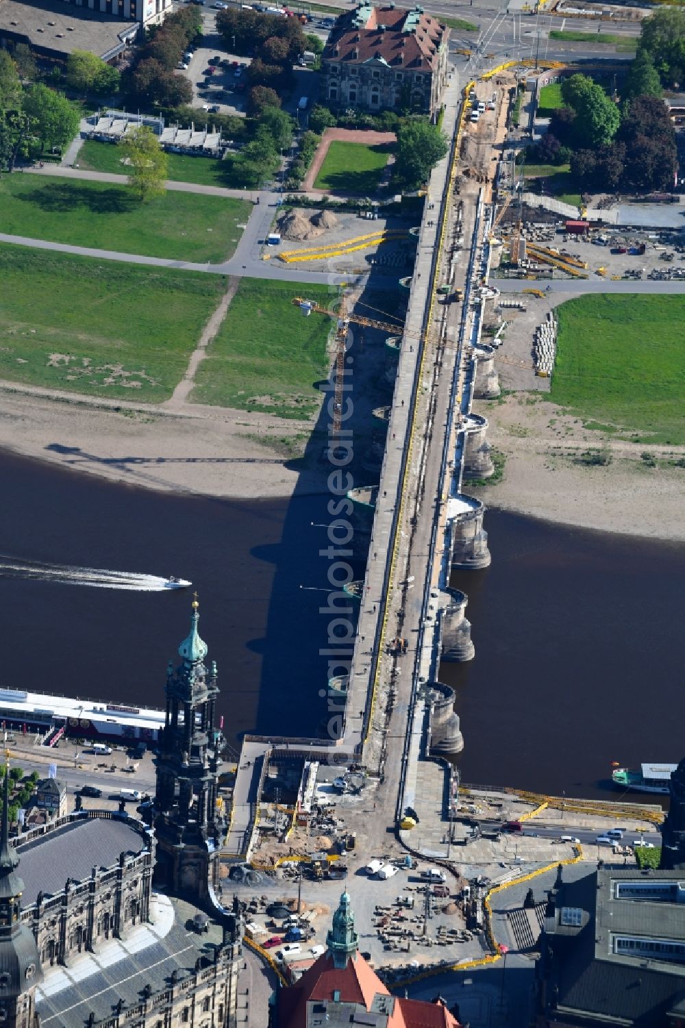 Aerial image Dresden - Construction to renovation work on the road bridge structure Augustusbruecke about the shore of elbe river in Dresden in the state Saxony, Germany