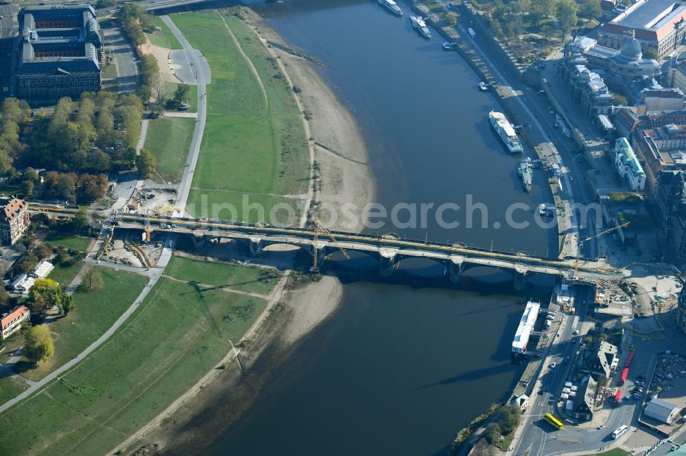Aerial photograph Dresden - Construction to renovation work on the road bridge structure Augustusbruecke about the shore of elbe river in Dresden in the state Saxony, Germany