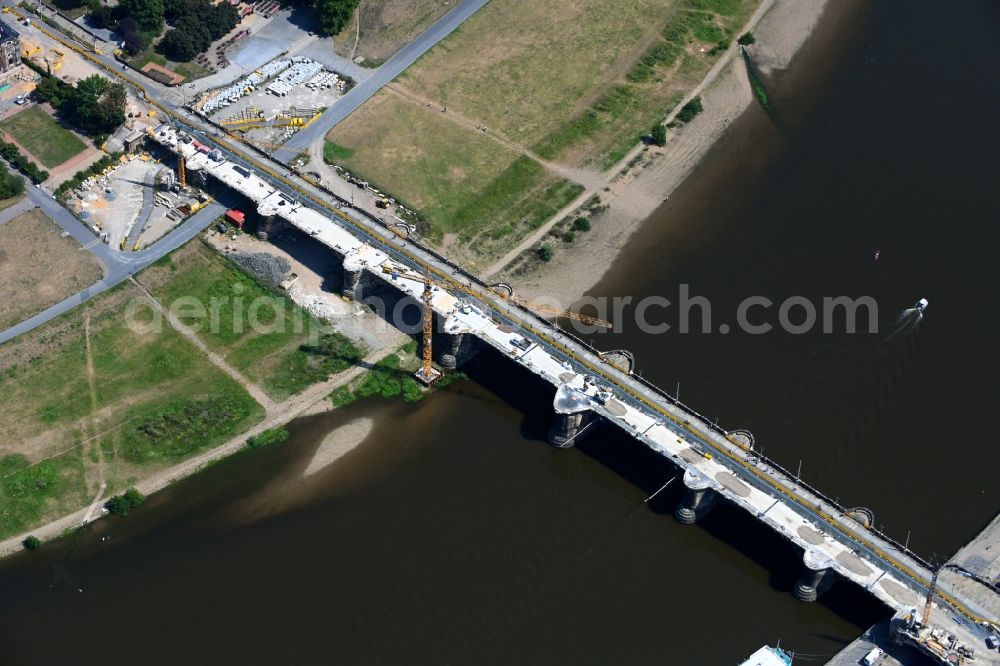 Dresden from above - Construction to renovation work on the road bridge structure Augustusbruecke about the shore of elbe river in Dresden in the state Saxony, Germany