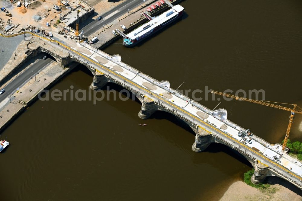 Aerial photograph Dresden - Construction to renovation work on the road bridge structure Augustusbruecke about the shore of elbe river in Dresden in the state Saxony, Germany