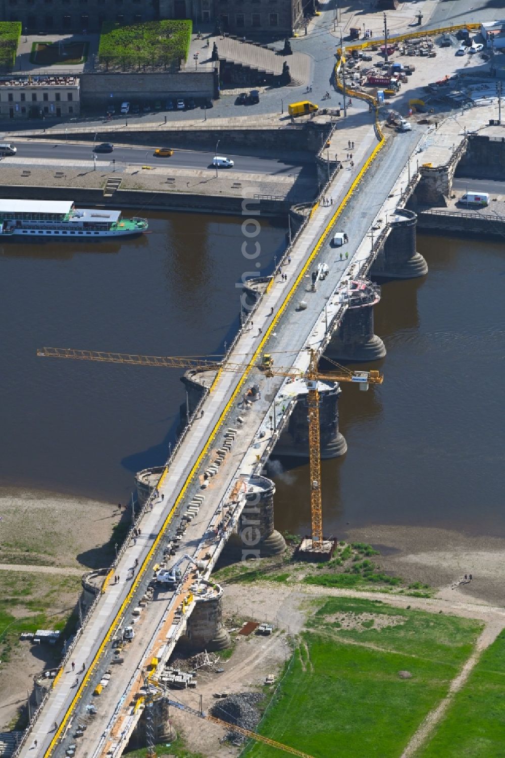 Dresden from above - Construction to renovation work on the road bridge structure Augustusbruecke about the shore of elbe river in Dresden in the state Saxony, Germany