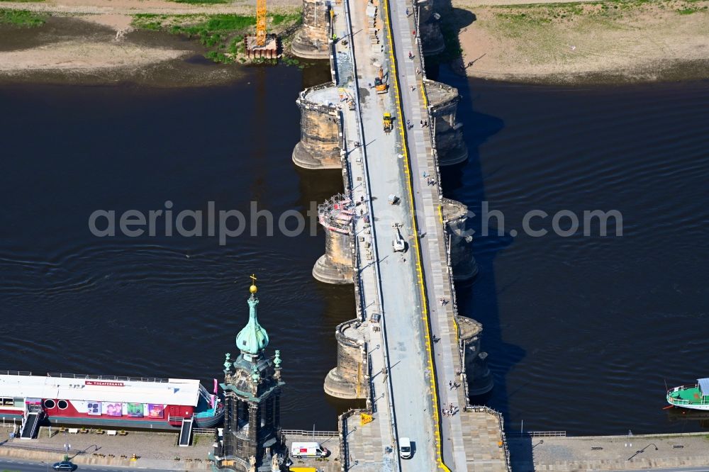 Dresden from the bird's eye view: Construction to renovation work on the road bridge structure Augustusbruecke about the shore of elbe river in Dresden in the state Saxony, Germany