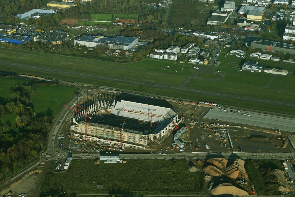 Aerial image Freiburg im Breisgau - Construction site on the sports ground of the stadium SC-Stadion of Stadion Freiburg Objekttraeger GmbH & Co. KG (SFG) in the district Bruehl in Freiburg im Breisgau in the state Baden-Wuerttemberg, Germany. The new stadium is next to the airport EDTF