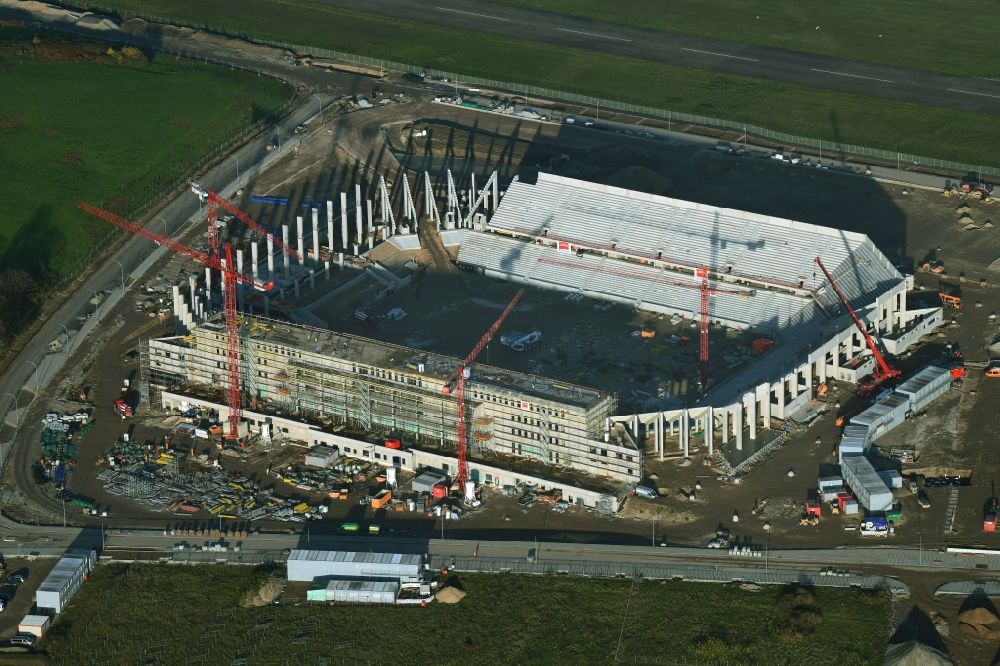 Aerial photograph Freiburg im Breisgau - Construction site on the sports ground of the stadium SC-Stadion of Stadion Freiburg Objekttraeger GmbH & Co. KG (SFG) in the district Bruehl in Freiburg im Breisgau in the state Baden-Wuerttemberg, Germany. The new stadium is next to the airport EDTF
