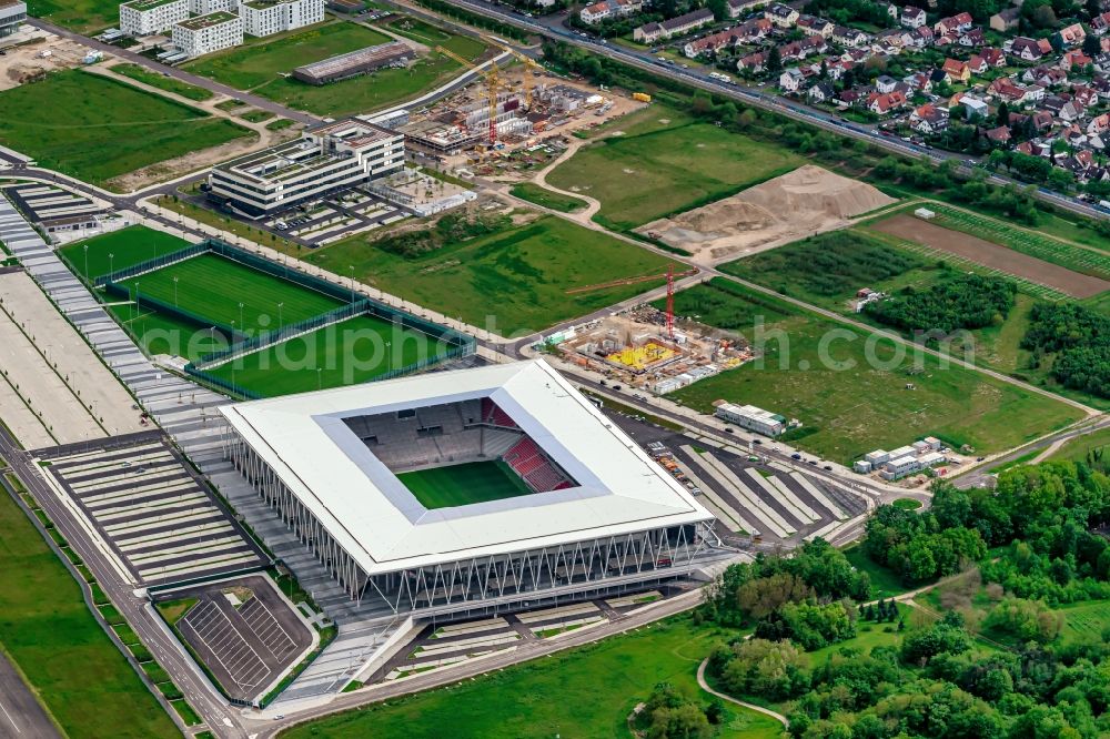 Freiburg im Breisgau from above - Construction site on the sports ground of the stadium SC-Stadion of Stadion Freiburg Objekttraeger GmbH & Co. KG (SFG) in the district Bruehl in Freiburg im Breisgau in the state Baden-Wurttemberg, Germany. The new stadium is next to the airport EDTF