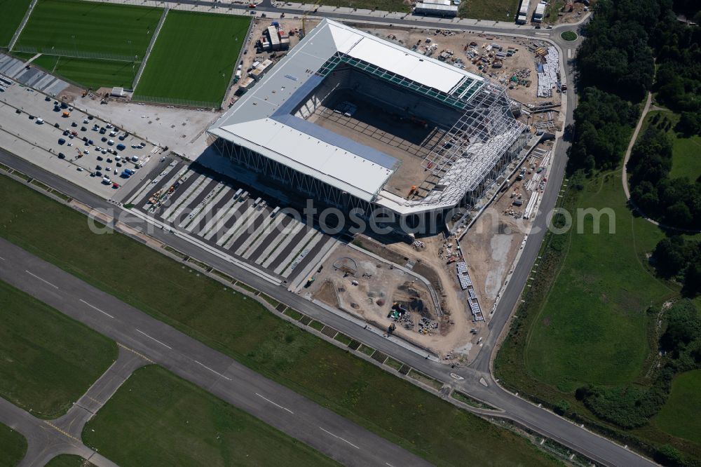 Aerial image Freiburg im Breisgau - Construction site on the sports ground of the stadium SC-Stadion of Stadion Freiburg Objekttraeger GmbH & Co. KG (SFG) in the district Bruehl in Freiburg im Breisgau in the state Baden-Wurttemberg, Germany. The new stadium is next to the airport EDTF