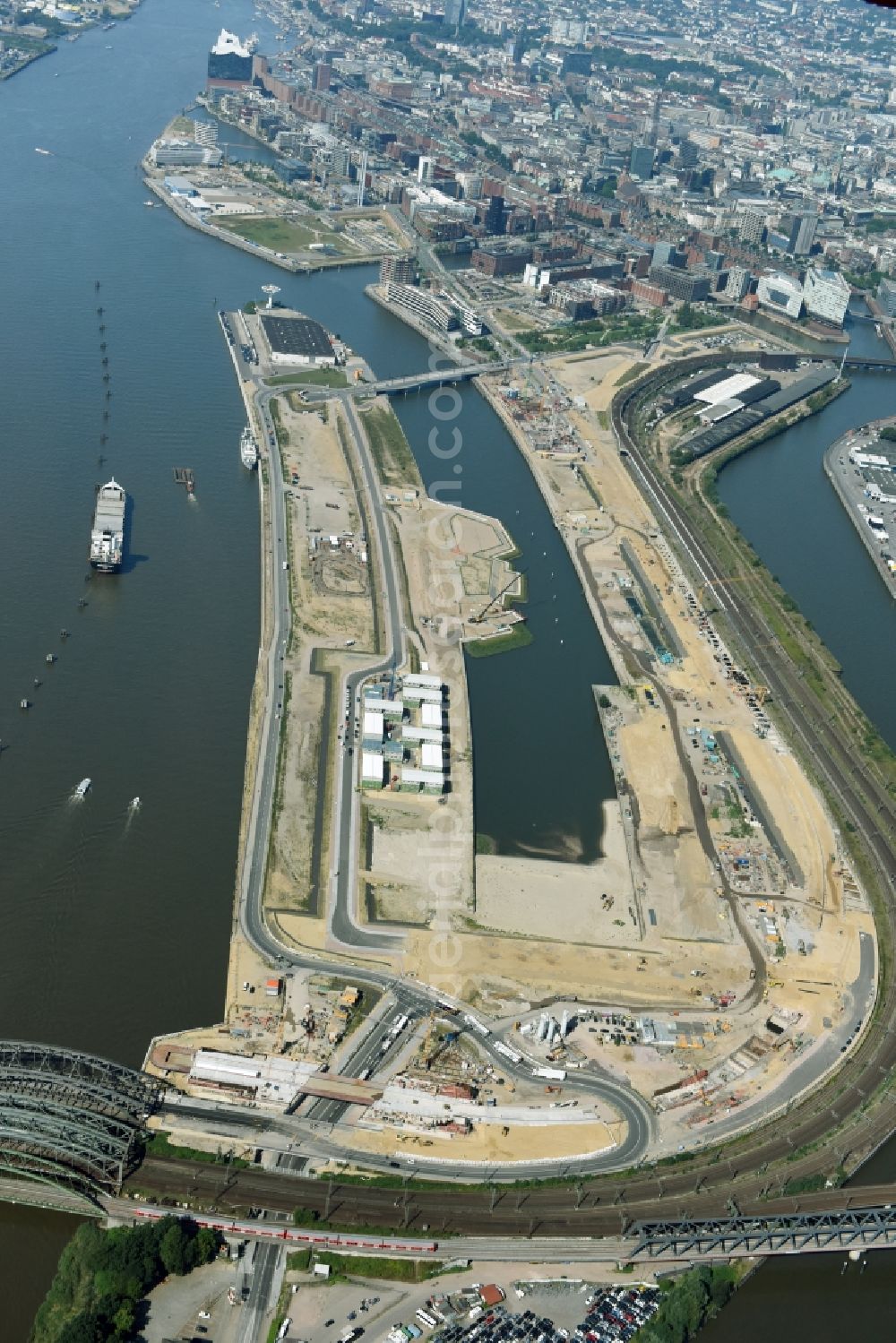 Hamburg from the bird's eye view: Construction site of the city development area Baakenhafen on the Elbe in Hamburg. Since the resolution of the Senate in 1998, the harbor and the surrounding headlands are formally part of the project HafenCity, where the port areas released south of the city center of Hamburg from its original use and to be converted to retail, commercial, residential and leisure-related areas