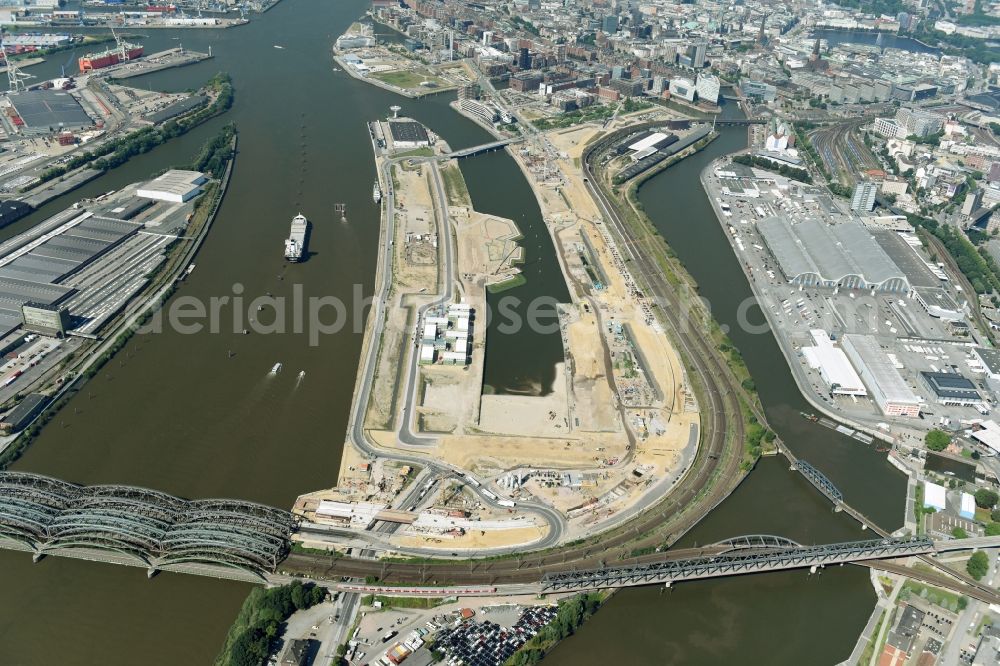 Aerial image Hamburg - Construction site of the city development area Baakenhafen on the Elbe in Hamburg. Since the resolution of the Senate in 1998, the harbor and the surrounding headlands are formally part of the project HafenCity, where the port areas released south of the city center of Hamburg from its original use and to be converted to retail, commercial, residential and leisure-related areas