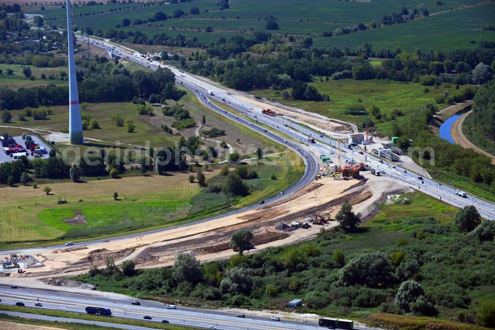 Schönerlinde from the bird's eye view: Construction to extend the traffic flow at the intersection- motorway A 114 - A10 - Dreieck Pankow in Schoenerlinde in the state Brandenburg, Germany