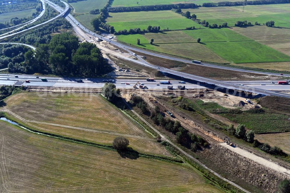 Aerial photograph Leegebruch - Construction to extend the traffic flow at the intersection- motorway A 10 - A110 a?? Kreuz Oranienburg a?? in Leegebruch in the state Brandenburg, Germany
